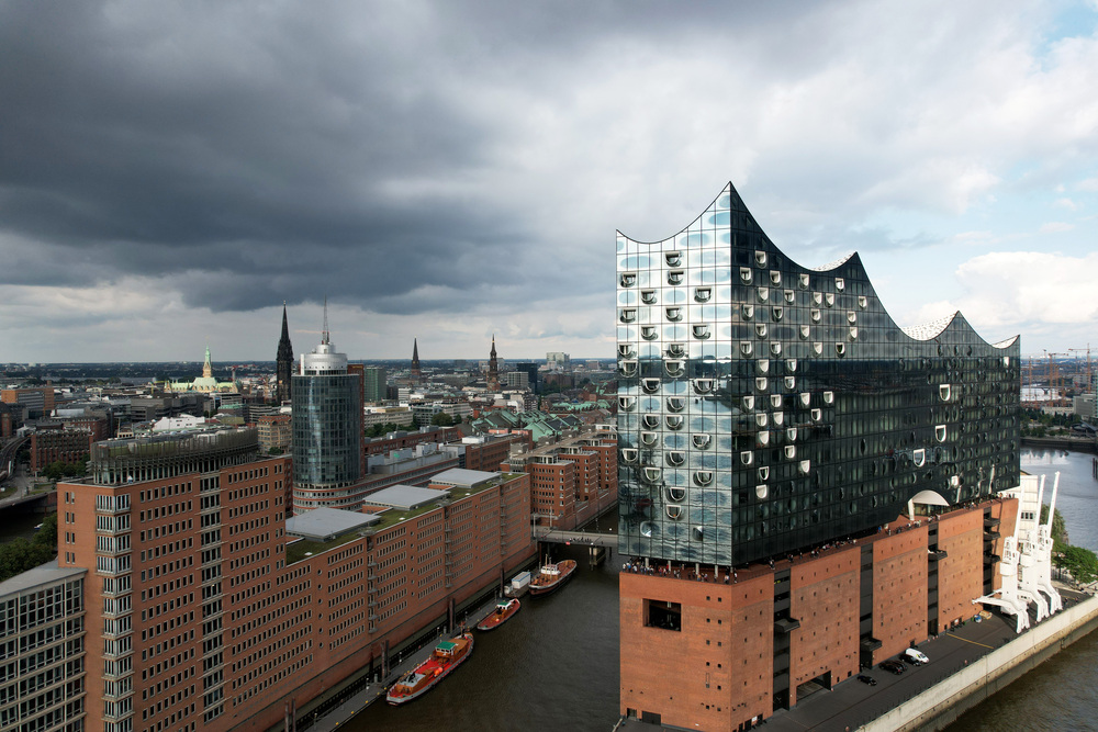 Aerial view of the Elbphilharmonie concert hall on the shore of the Elbe river in Hamburg